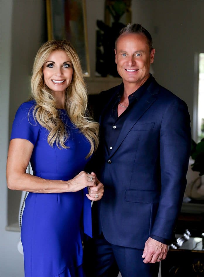 Man and woman in business attire in royal blue